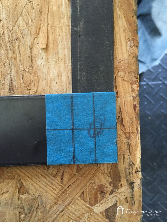 How to Make a Barn Door Style Fireplace Screen | Designertrapped.com Learn how to make a barn door style fireplace screen without welding! This DIY sliding fireplace screen is easier than it looks to make!