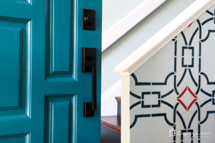 Never underestimate the impact of a simple front door update to increase your curb appeal! The bold color on this front door and the new hardware make it a total showstopper! #ad #CurbAppeal