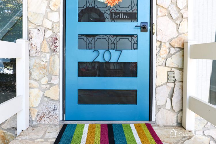 Never underestimate the impact of a simple front door update to increase your curb appeal! The bold color on this front door and the new hardware make it a total showstopper! #ad #CurbAppeal