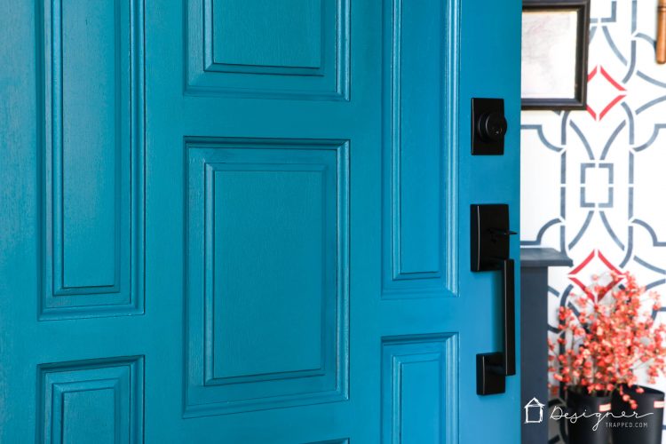 Never underestimate the impact of a simple front door update to increase your curb appeal! The bold color on this front door and the new hardware make it a total showstopper! #ad #CurbAppeal