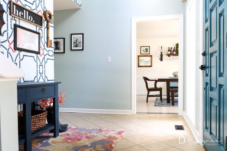 Never underestimate the impact of a simple front door update to increase your curb appeal! The bold color on this front door and the new hardware make it a total showstopper! #ad #CurbAppeal