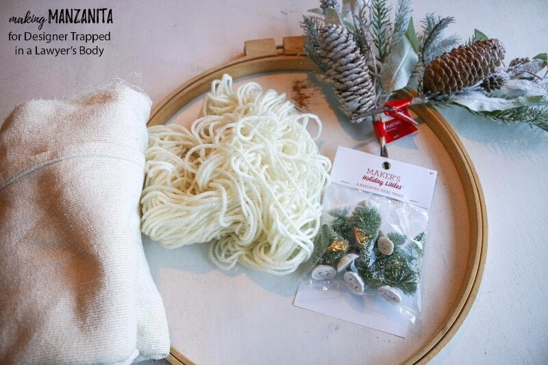 This DIY winter wreath is an easy way to add a touch of Winter beauty to your home! The Boho style of this winter wreath is so fun and different.